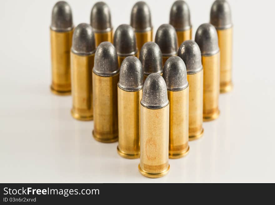 Bullets for gun on white background