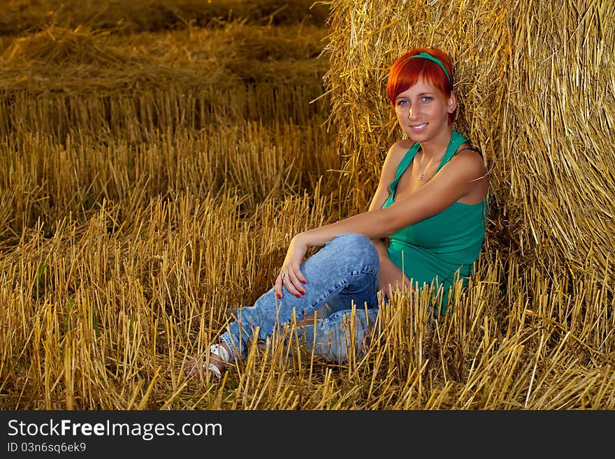 Young woman in wheat field