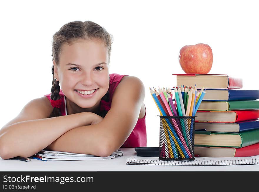 Portrait of the young girl with books