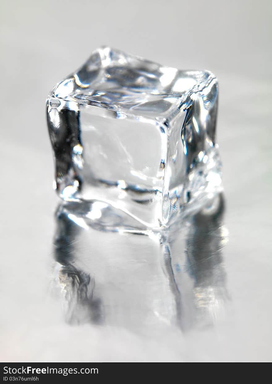 Ice cubes against a gray background