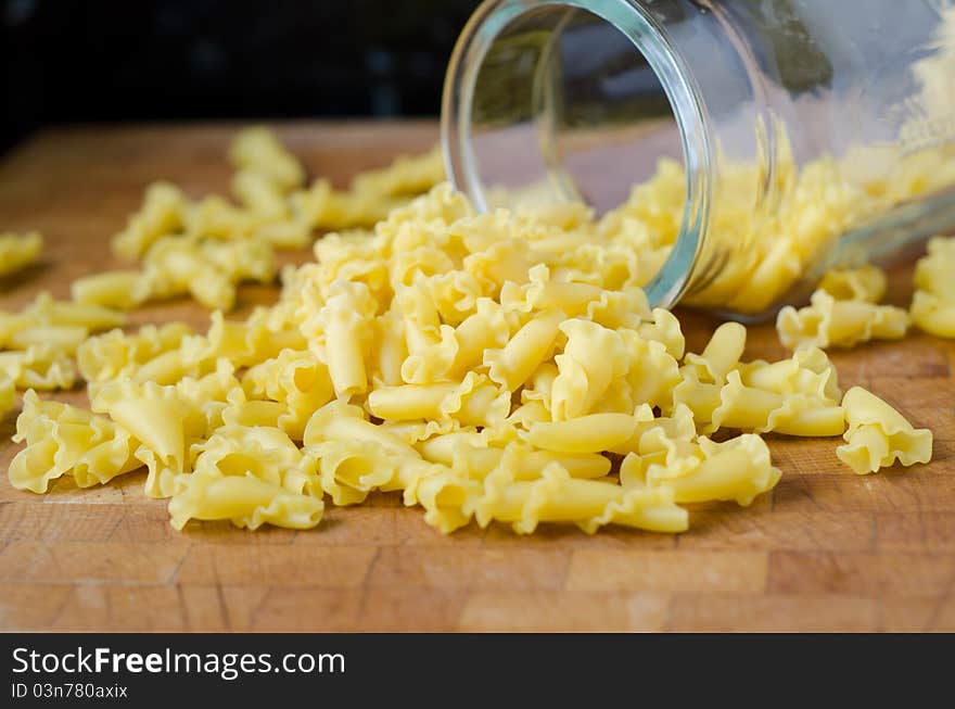 Raw noodles on a wood