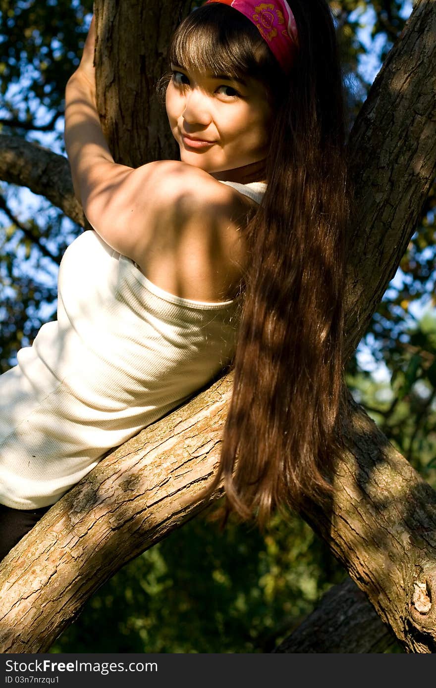 Girl climbing a tree