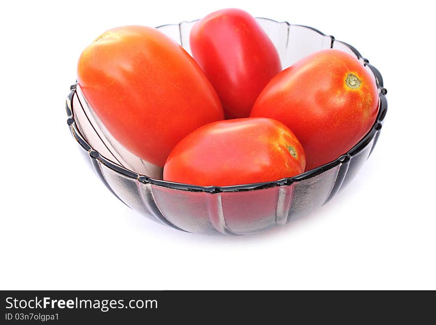 Fresh tomatoes tomatoes in bowl  on a white background close-up