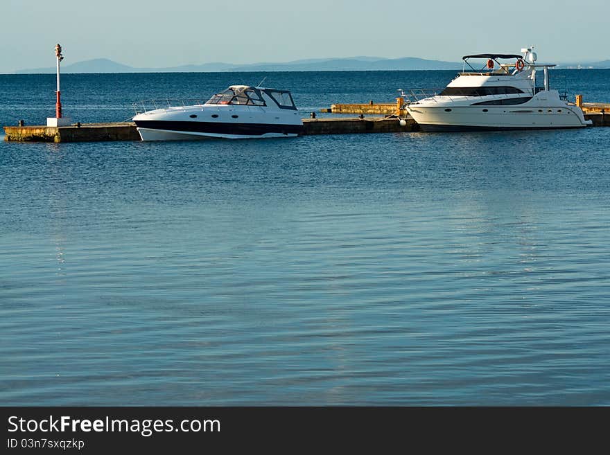 Two yachts in  sea at mooring