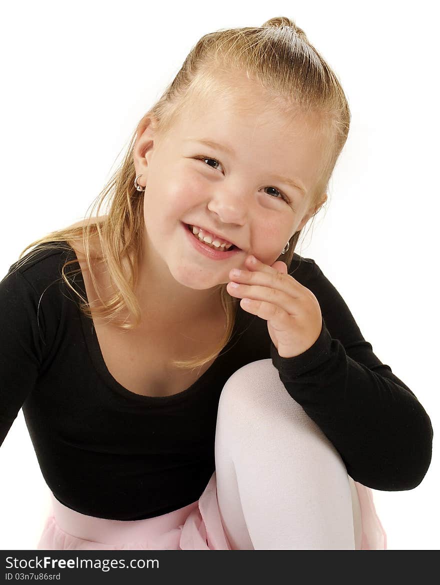 Closeup image of an adorable 3-year-old dressed in her ballerina outfit. Isolated on white. Closeup image of an adorable 3-year-old dressed in her ballerina outfit. Isolated on white.