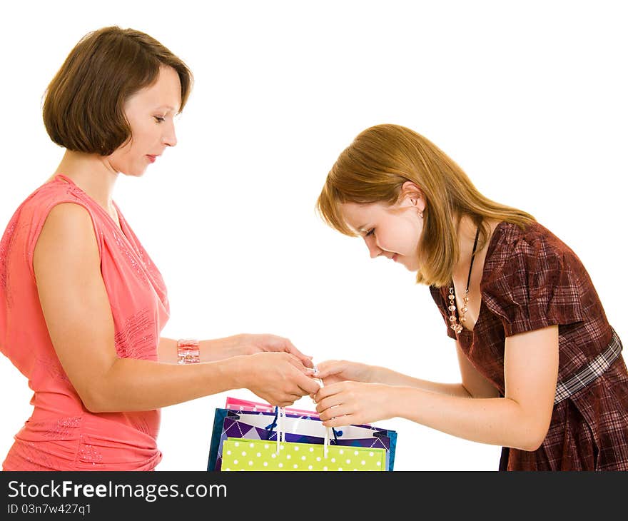 Girls with shopping on white background.