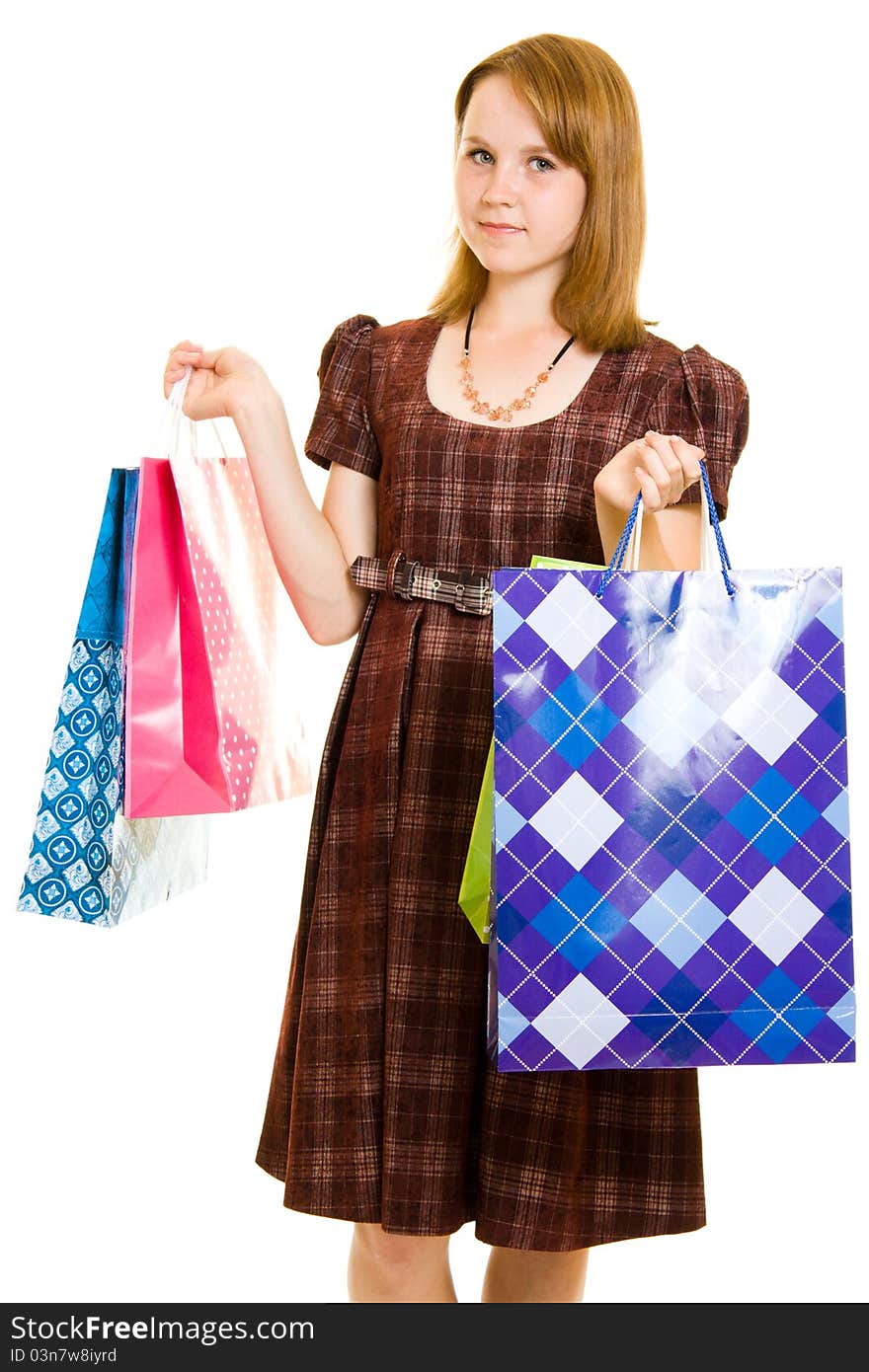 Girl with shopping on white background.