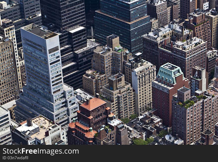 New York City view of top of buildings in midtown manhatten from the Empire State building. New York City view of top of buildings in midtown manhatten from the Empire State building