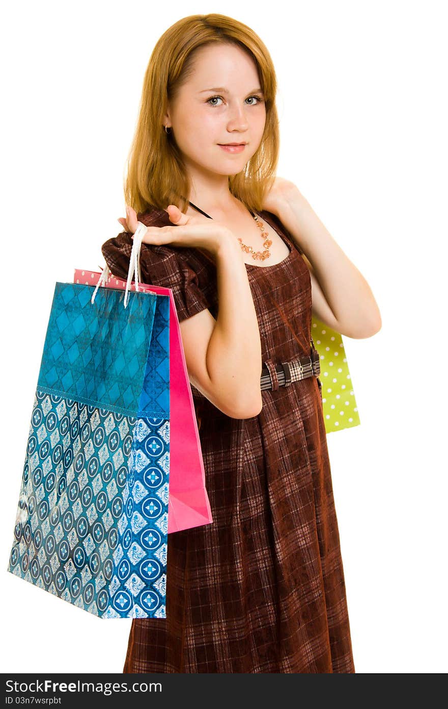 Girl with shopping on white background.