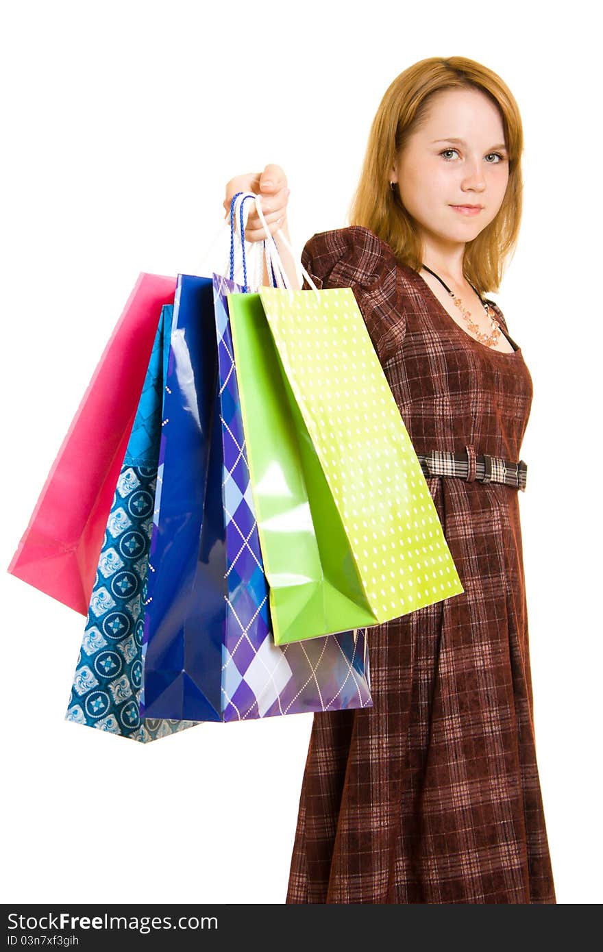 Girl with shopping on white background.