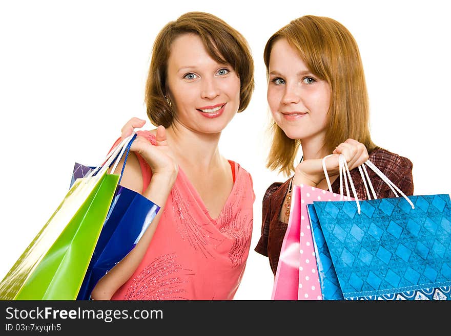 Girls with shopping on white background.