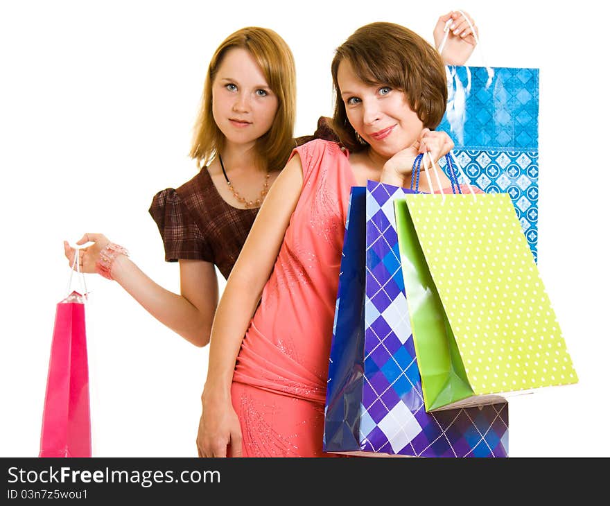 Girls with shopping on white background.