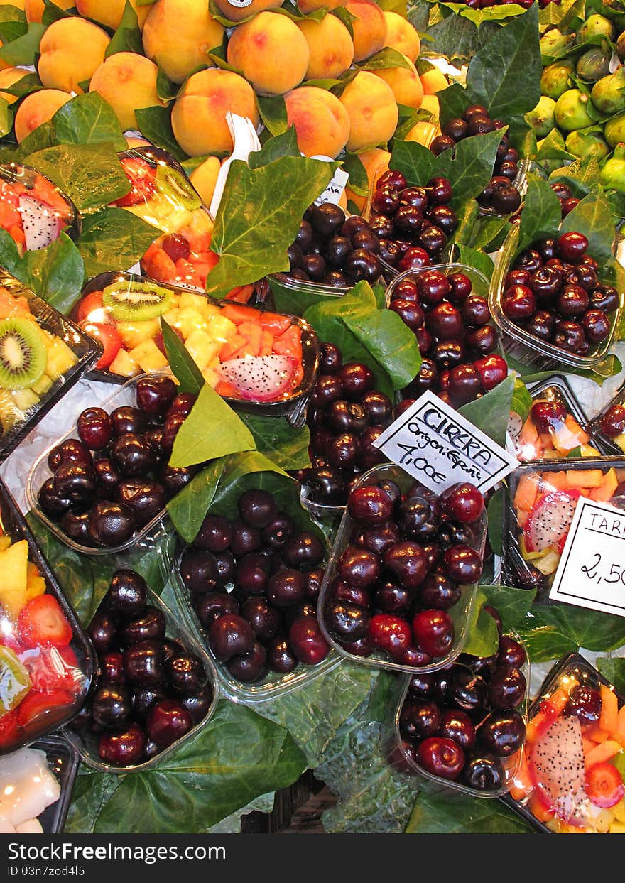 Beautiful fruits and cherries Boqueria market Barcelona