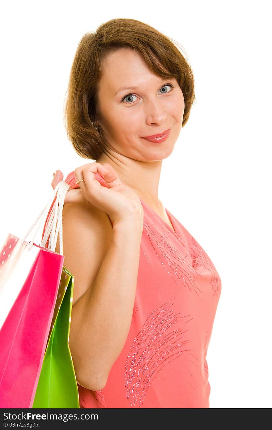 Girl with shopping on white background.