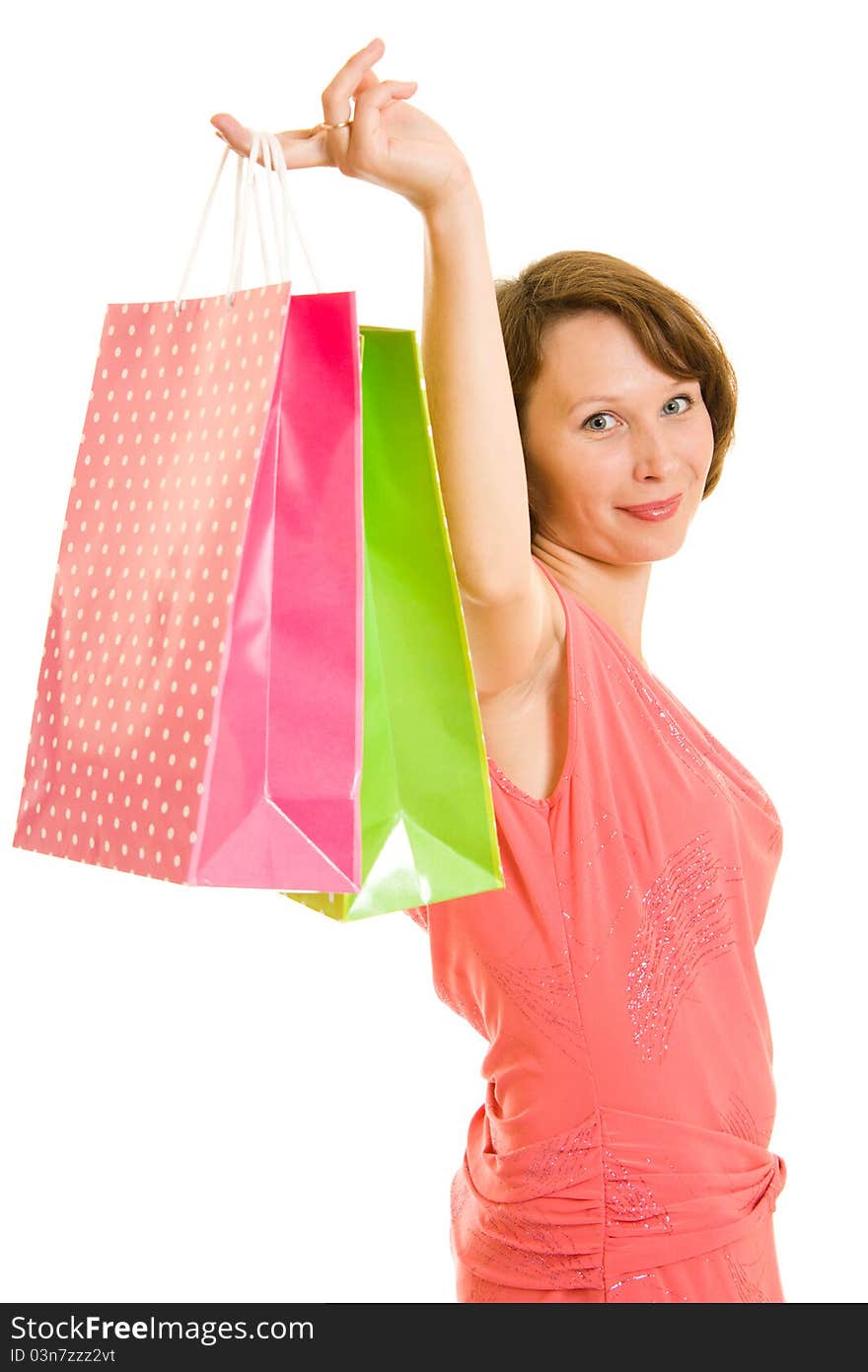 Girl with shopping on white background.