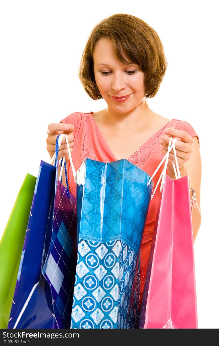 Girl with shopping on white background.