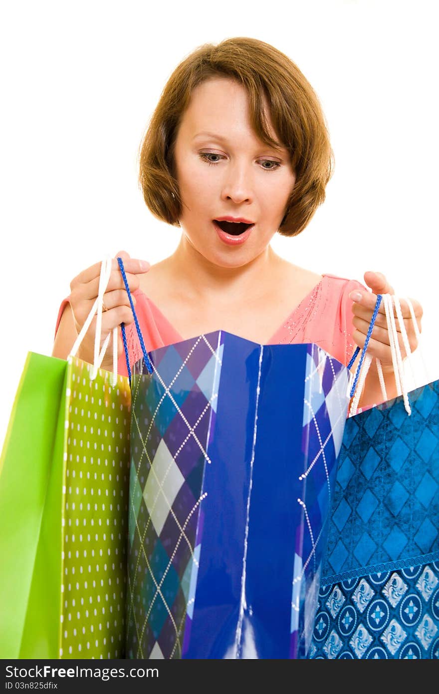 Girl with shopping on white background.