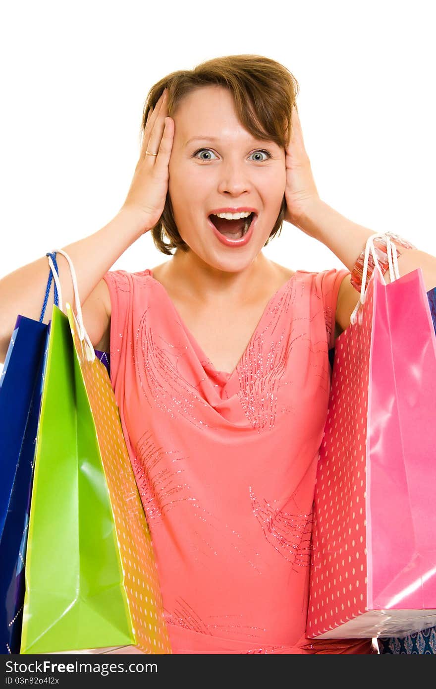 Girl with shopping on white background.