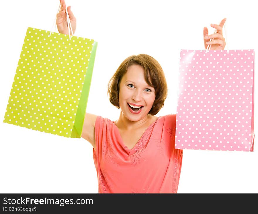 Girl with shopping on white background.