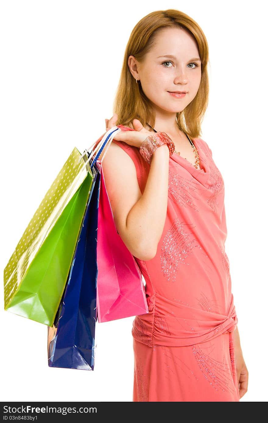 Girl with shopping on white background.