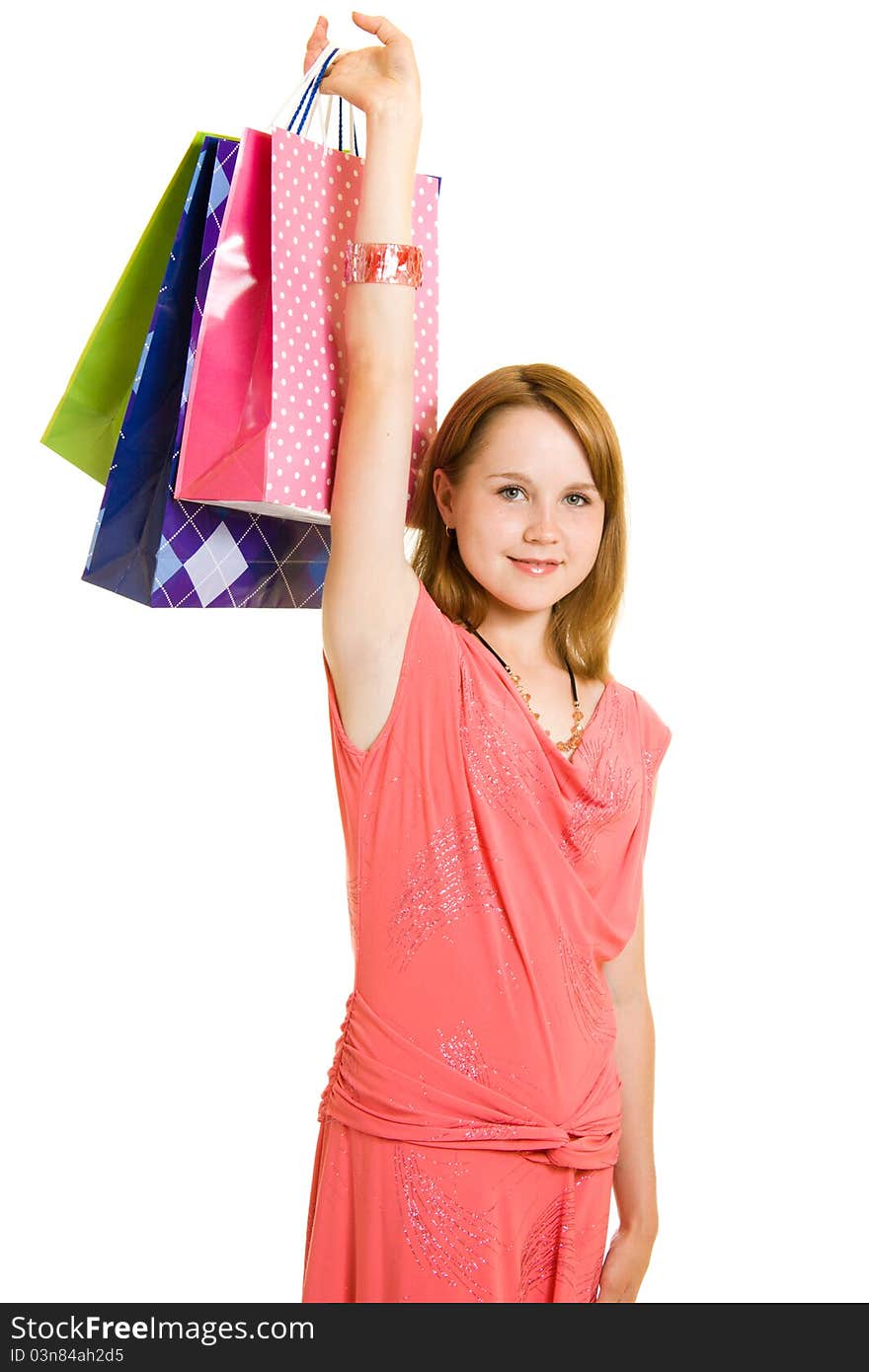 Girl with shopping on white background.