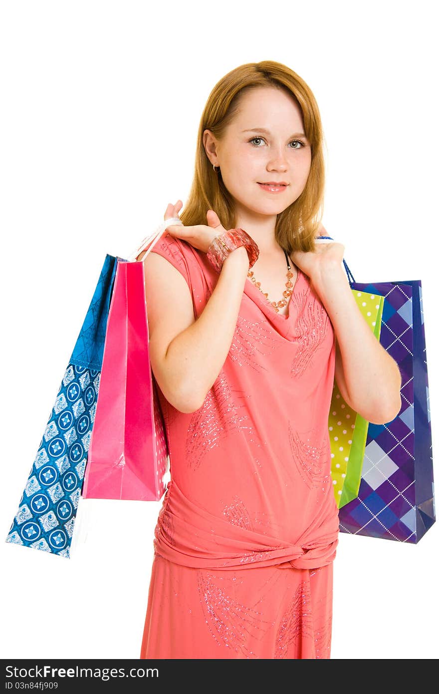 Girl with shopping on white background.