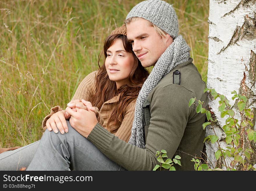 Happy couple lie in the wood. Happy couple lie in the wood