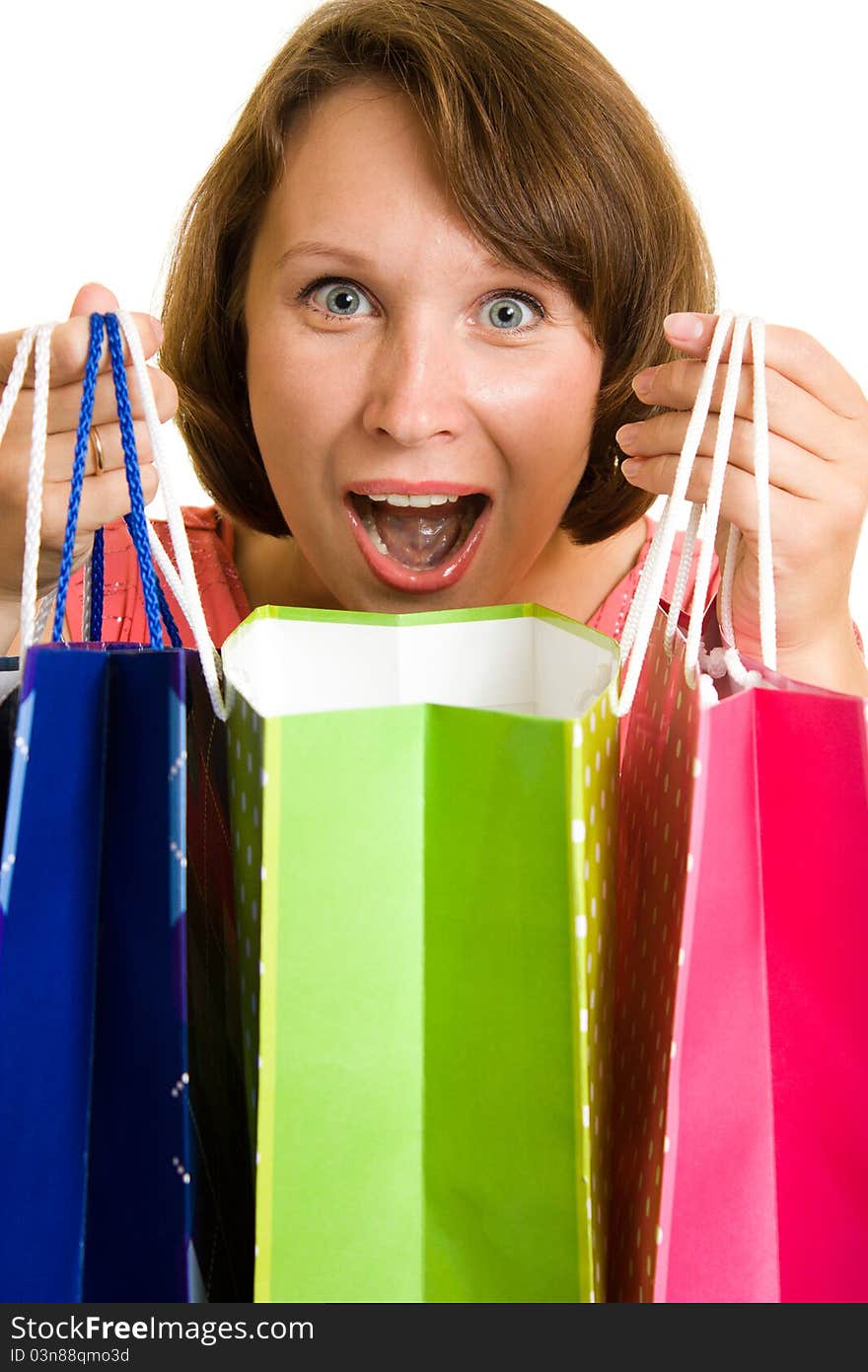 Girl with shopping on white background.