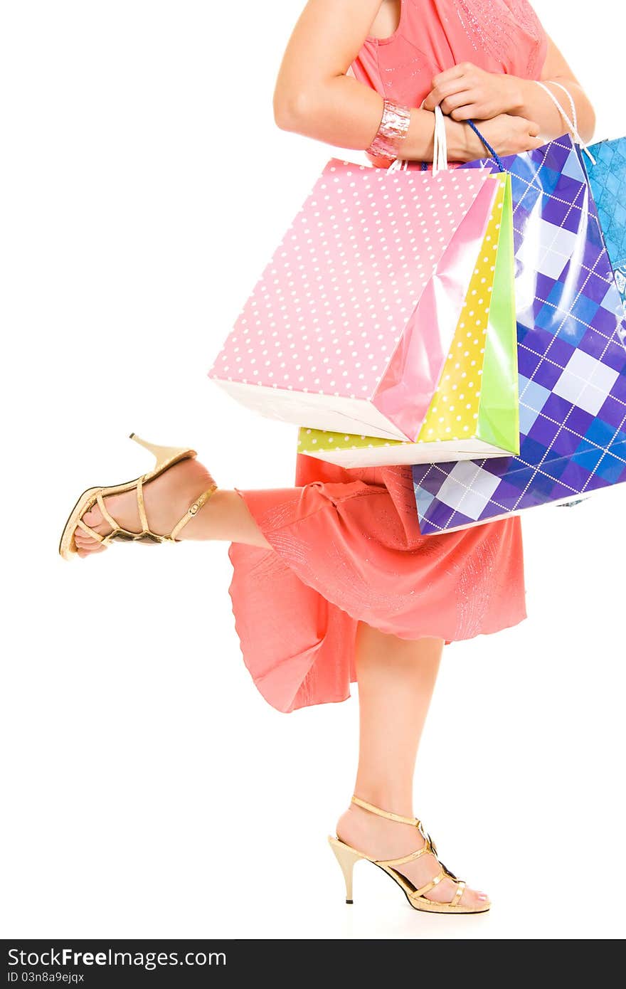 Girl with shopping on white background.