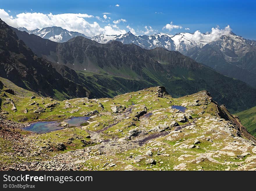 Small lakes in high mountain during summer. Small lakes in high mountain during summer