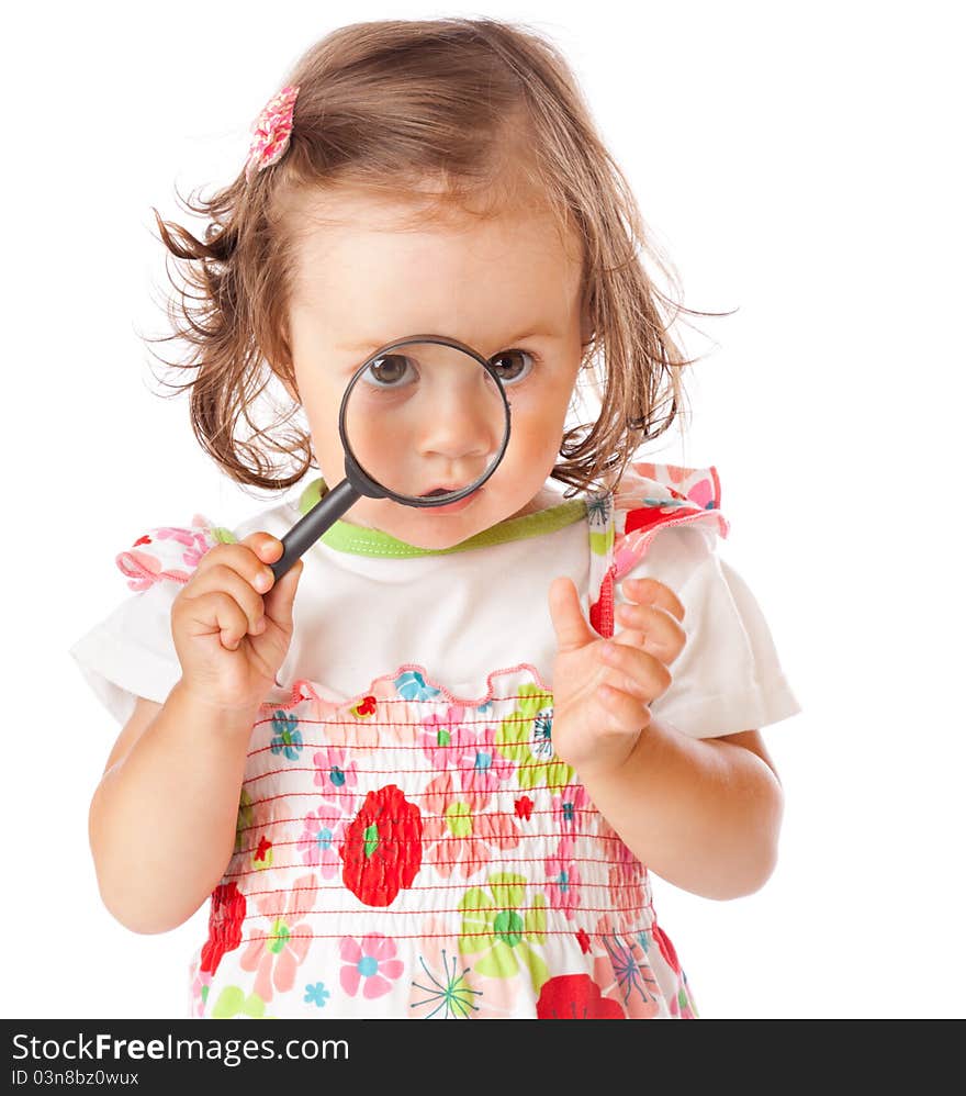 A Little Girl Is Looking Through The Loupe