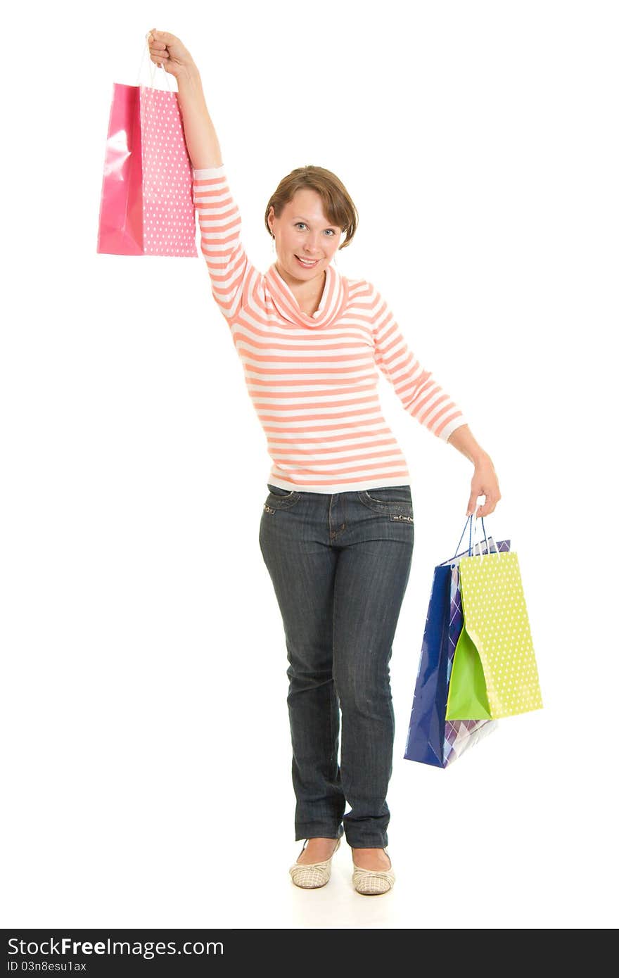 Girl with shopping on white background.