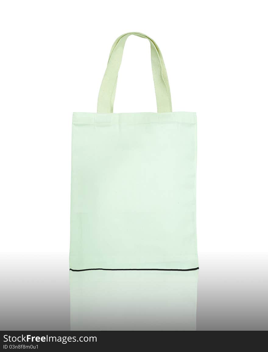 White cotton bag on reflect floor and white background