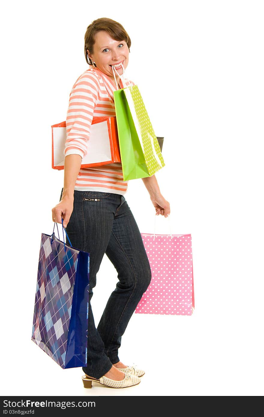 Girl with shopping on white background.