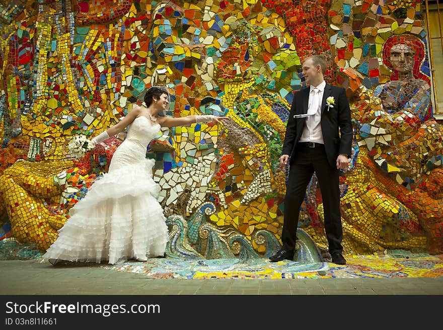 Bride and groom stand and hug. Bride and groom stand and hug