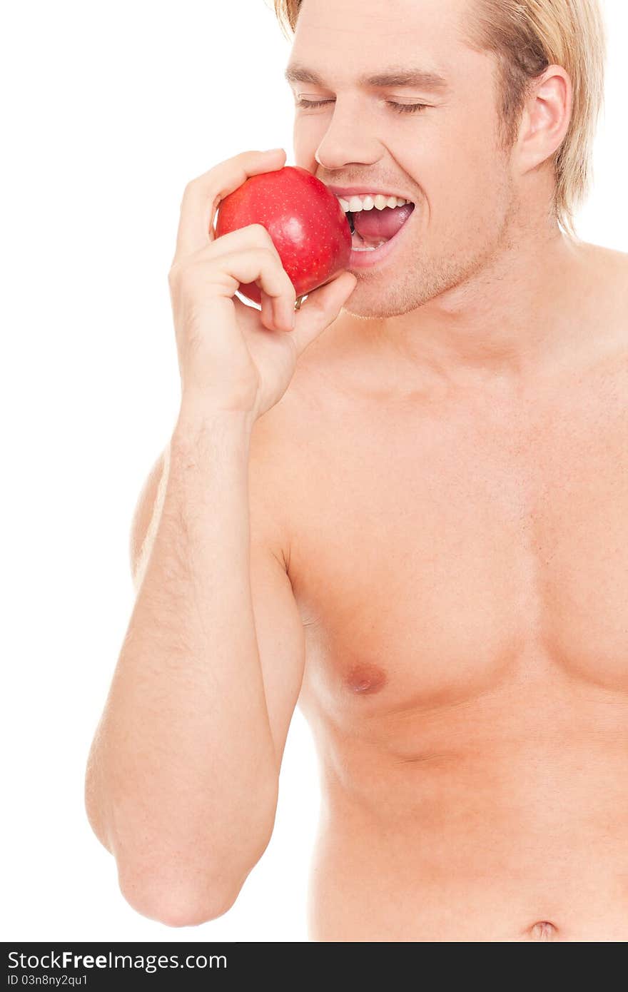 Happy man eating an apple