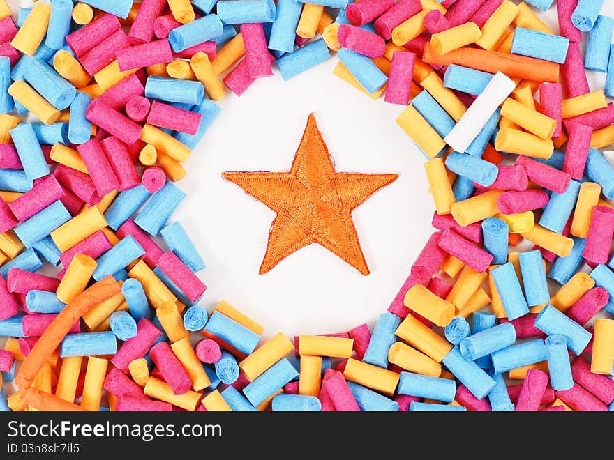 Orange Star in the Middle Of Paper Rolls For Arts And Craft