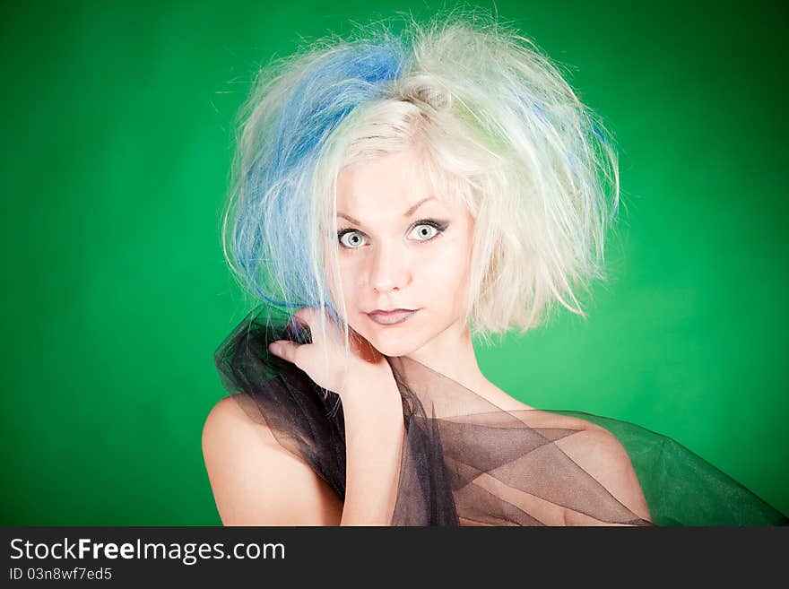 Shocked crazy girl, studio isolated over green background shot