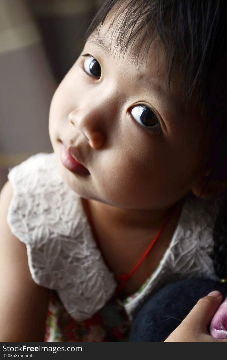 Bright picture of adorable chinese girl Smiling. Bright picture of adorable chinese girl Smiling