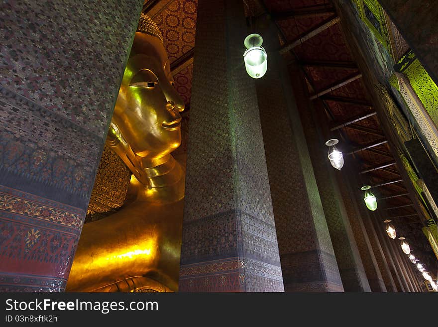 Reclining buddha Wat Pho in Bangkok Thailand.