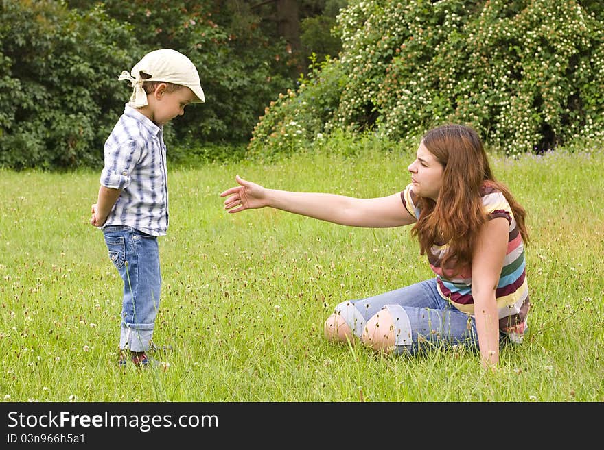 Mother and son in park