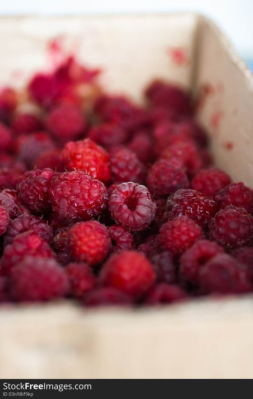 Ripe fresh organic raspberries in a box. Ripe fresh organic raspberries in a box