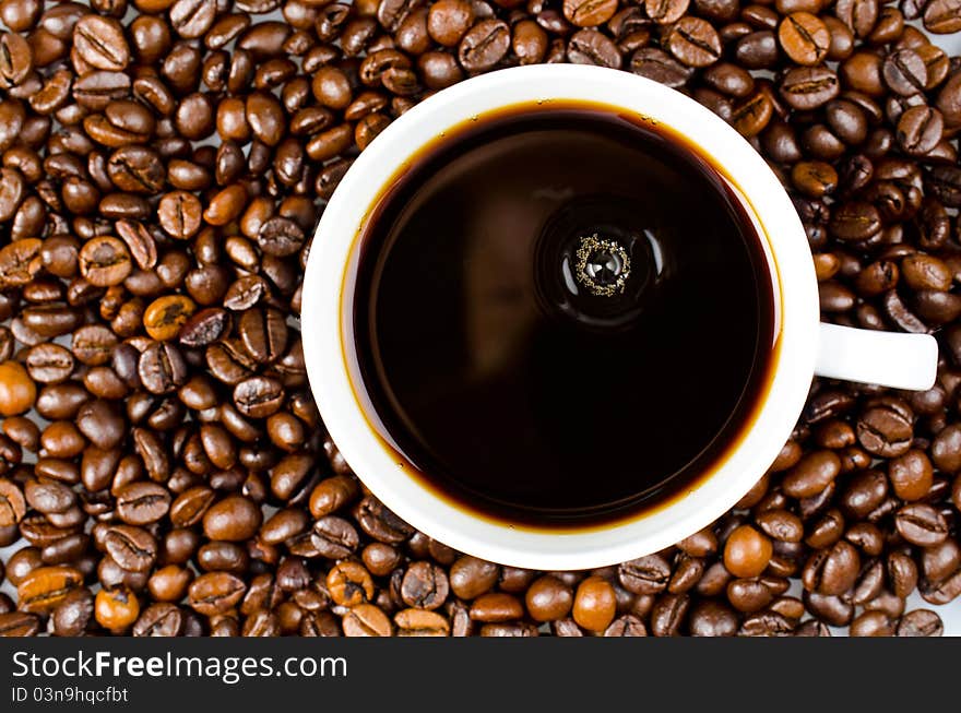 Coffee beans with white cup. Coffee beans with white cup