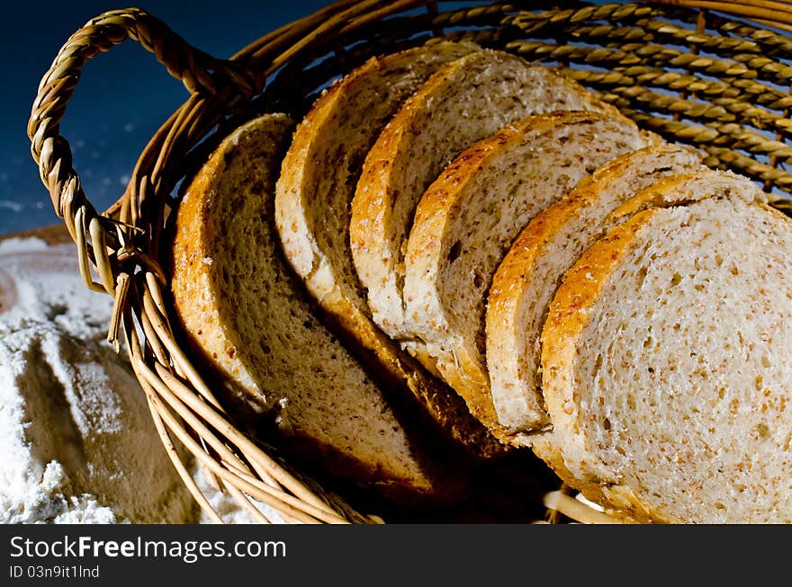 Sliced bread in a bread basket. Sliced bread in a bread basket