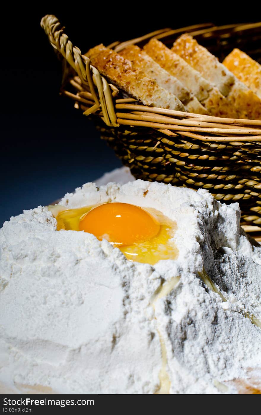 Detail of egg yolk on flour. Detail of egg yolk on flour