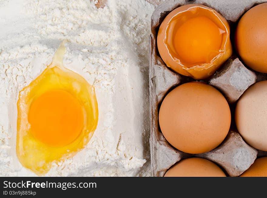 Detail of egg yolk on flour. Detail of egg yolk on flour