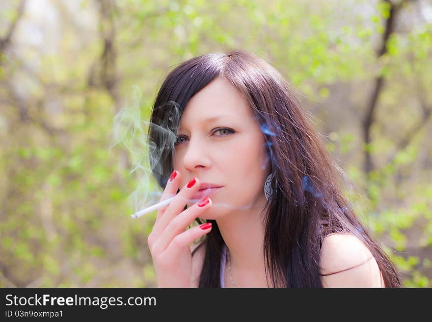 Pretty woman smoking