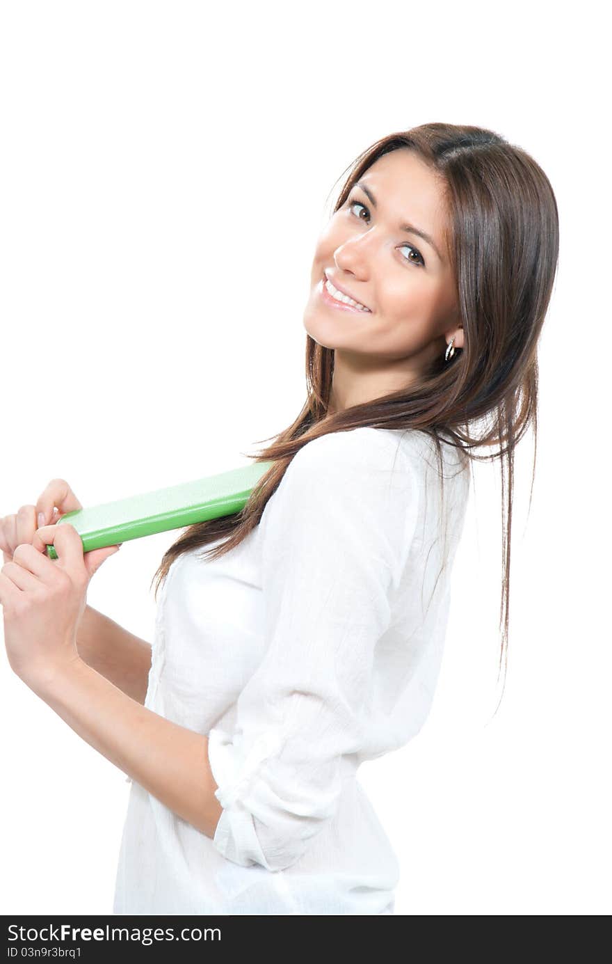 Pretty business woman smiling, holding notepad, ebook in green case on a white background