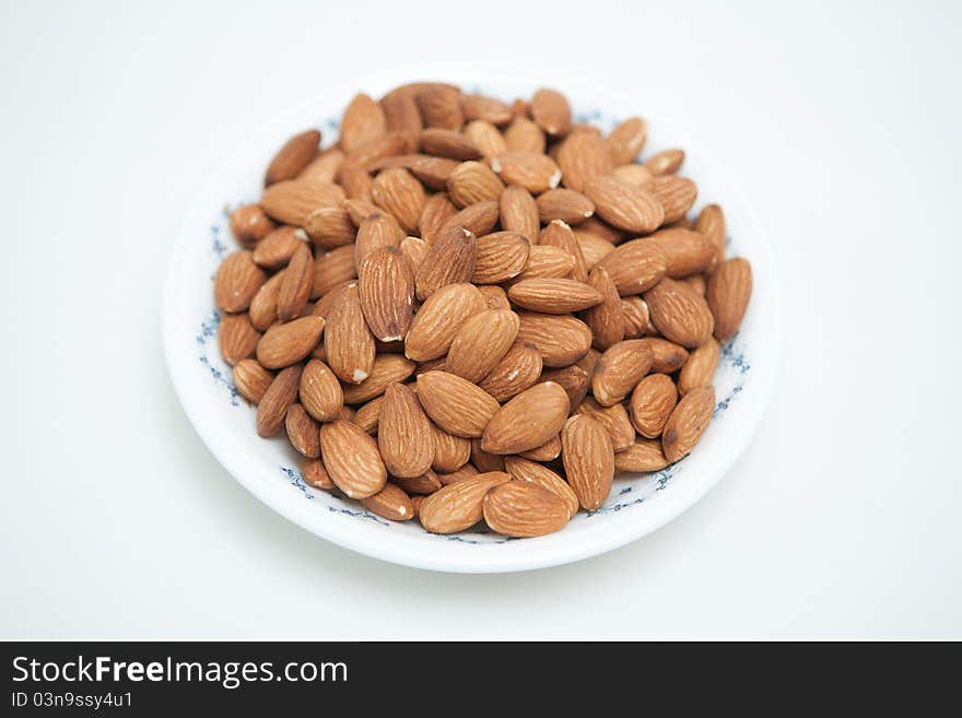 Contained in the almonds in a bowl appearance. Contained in the almonds in a bowl appearance.