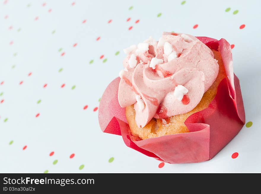 Celebration strawberry muffin with dots background